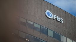 A sign for the Public Broadcasting Service is seen on its building headquarters in Arlington, Virginia, on February 18, 2025.