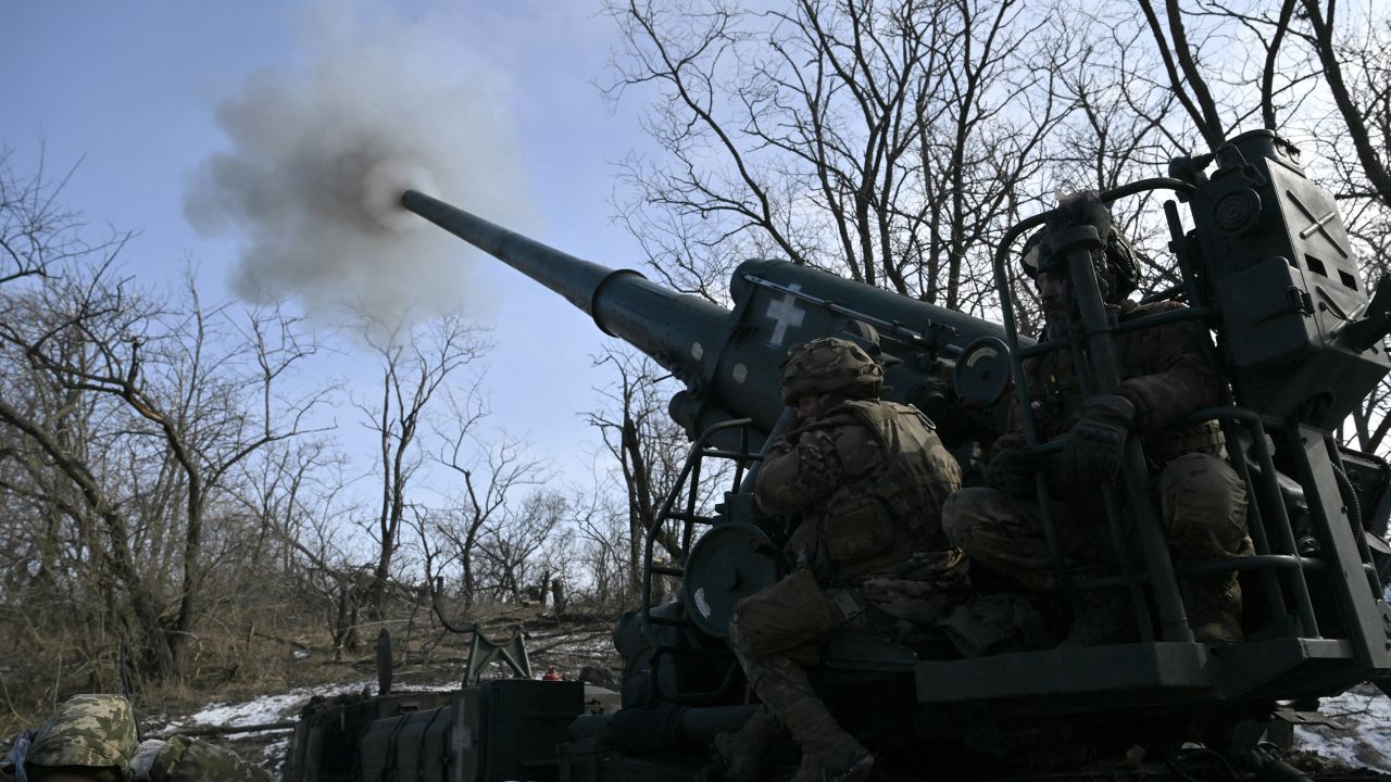 Ukrainian servicemen of the 43 Artillery Brigade fire a 2S7 Pion self-propelled cannon toward Russian positions, at a front line in the Donetsk region, on February 22, 2025, amid the Russian invasion of Ukraine.