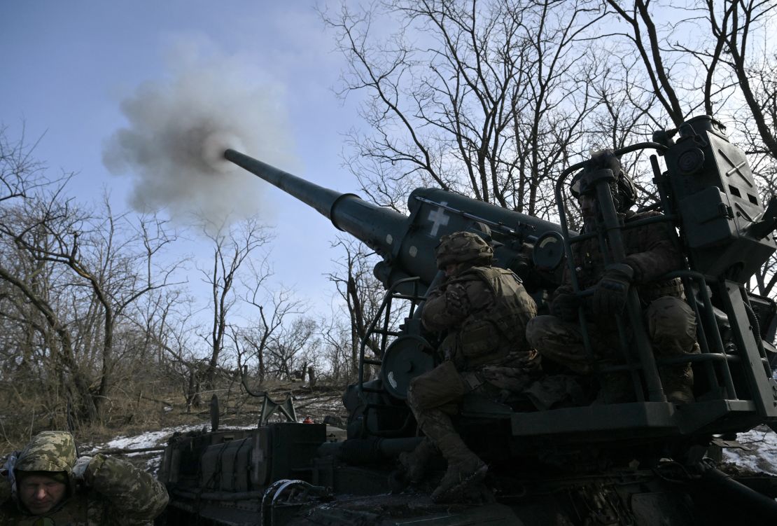 Ukrainian servicemen of the 43 Artillery Brigade fire a 2S7 Pion self-propelled cannon toward Russian positions, at a front line in the Donetsk region, on February 22, 2025, amid the Russian invasion of Ukraine.