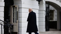 President Donald Trump walks to the Residence after arriving at the White House on February 22.