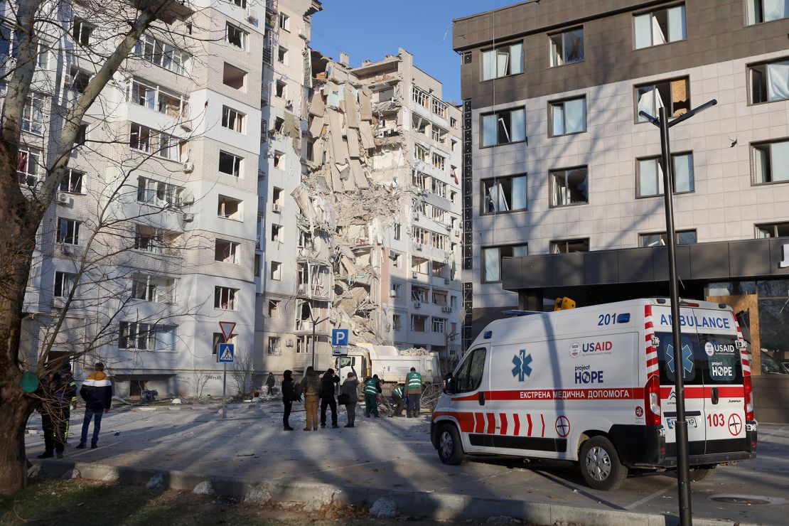 Rescue workers and medics work at the site of a Russian aviation attack on February 20, 2025 in Kherson, Ukraine.