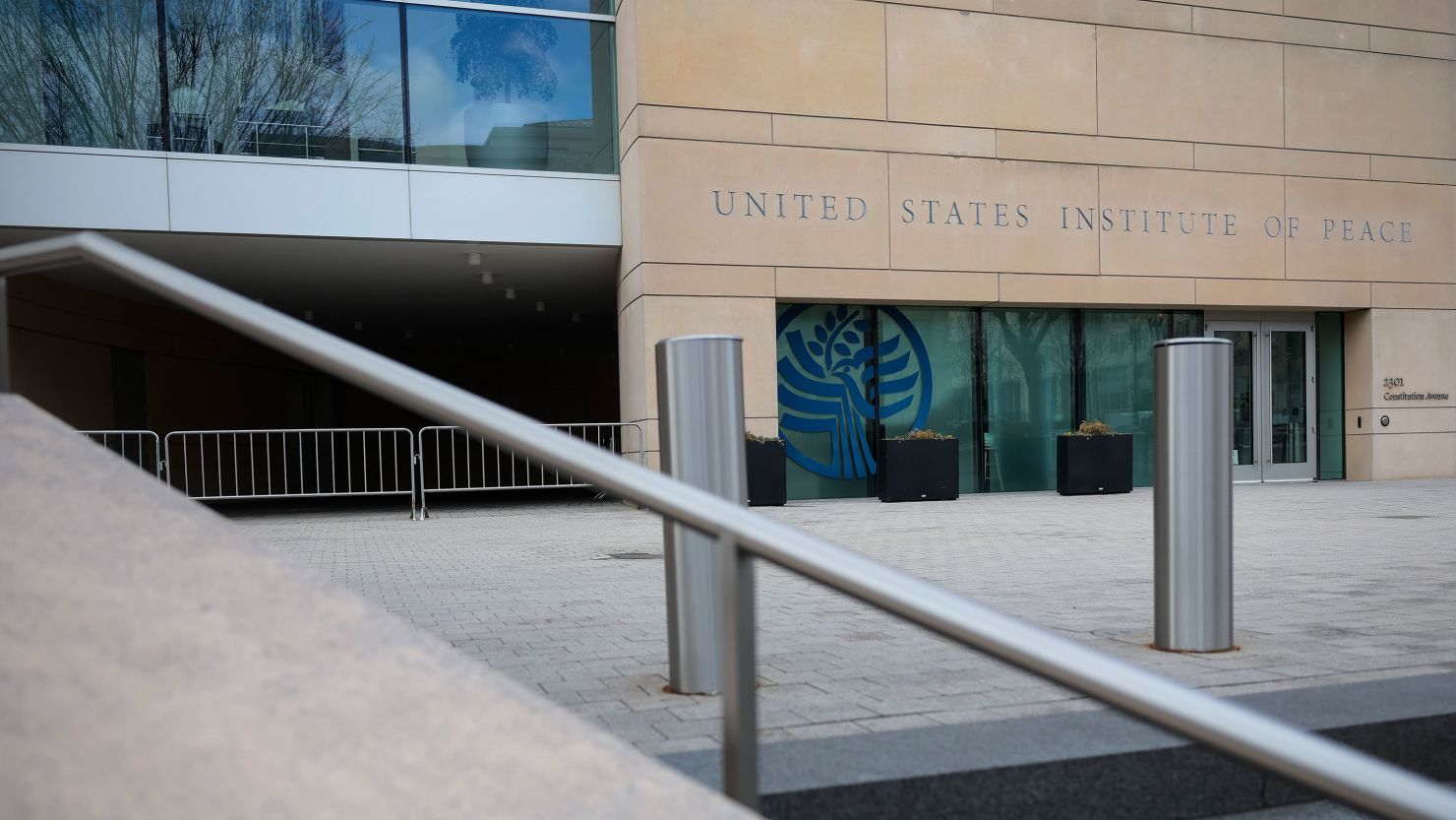 A sign for the United States Institute of Peace (USIP) is seen on its' building headquarters on February 20, 2025 in Washington, DC.