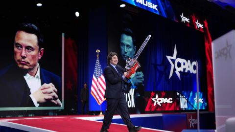 OXON HILL, MARYLAND - FEBRUARY 20: Argentinian President Javier Milei wields a chainsaw as he arrives on stage at the Conservative Political Action Conference (AC) at the Gaylord National Resort Hotel And Convention Center on February 20, 2025 in Oxon Hill, Maryland. The annual four-day gathering brings together conservative U.S. lawmakers, international leaders, media personalities and businessmen to discuss and champion conservative ideas. (Photo by Andrew Harnik/Getty Images)