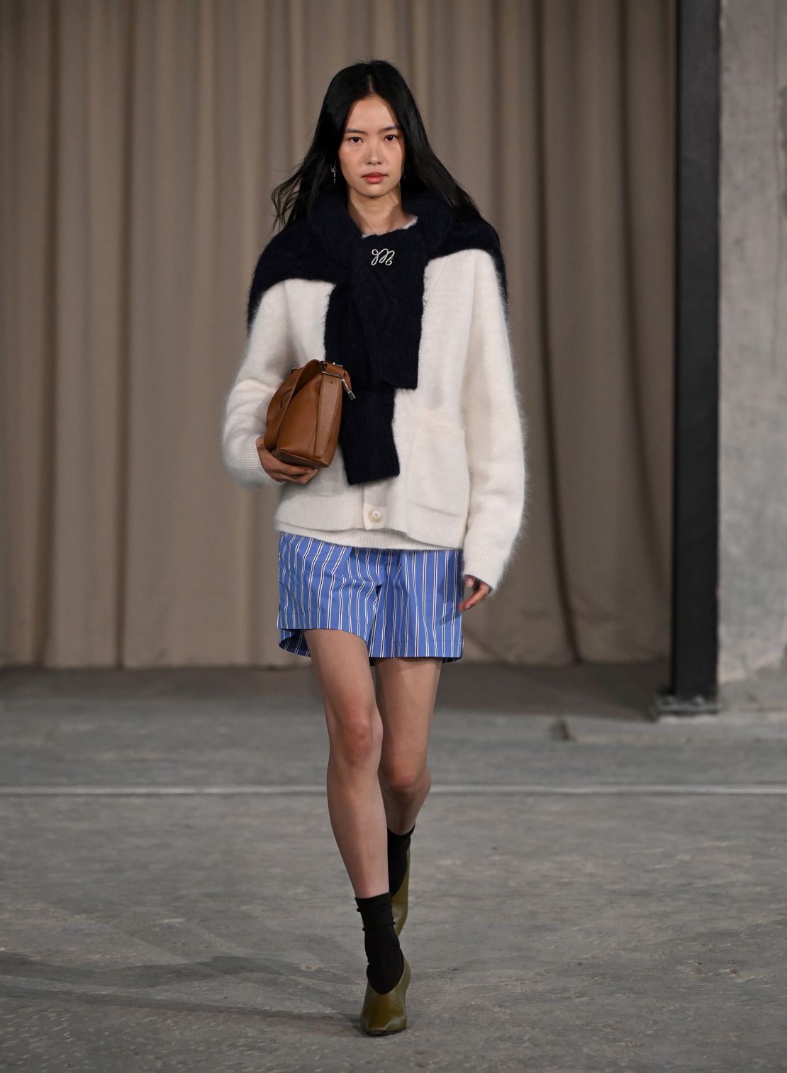 Oxford shirts and pinstriped boxer shorts were paired with fuzzy knits in classic colorways.