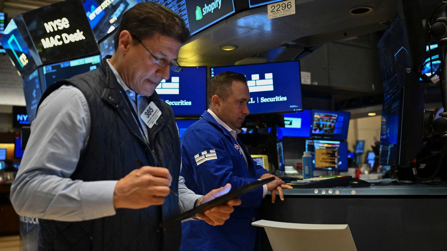 Traders work on the floor of the New York Stock Exchange.