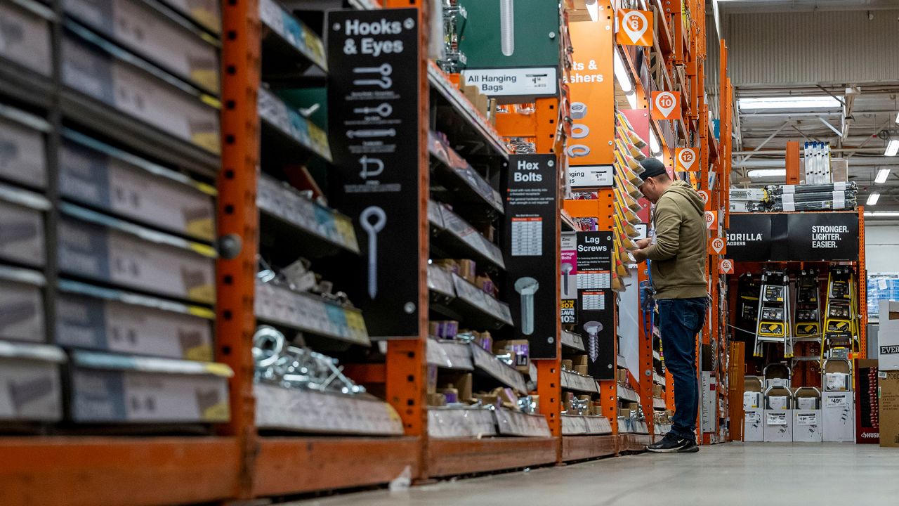 A shopper inside a Home Depot store in Roseville, California, US, on Monday, Feb. 24, 2025.