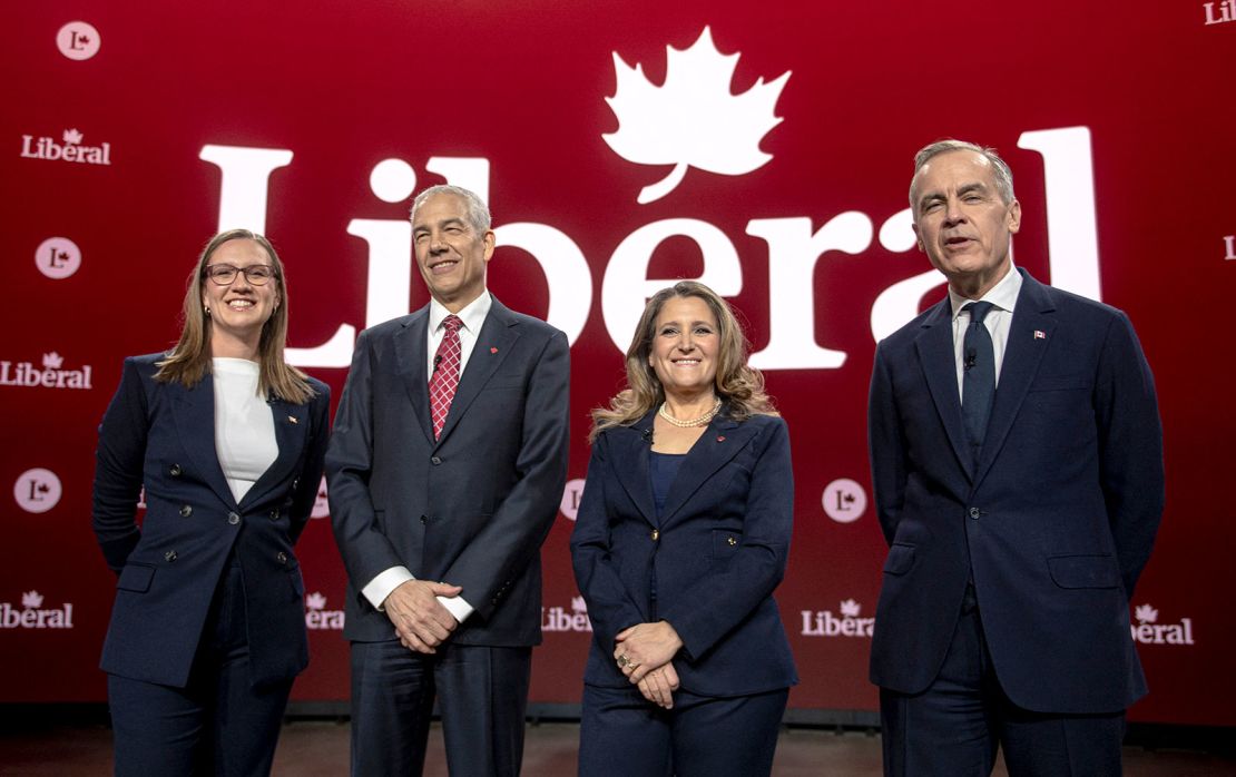 (L/R) Karina Gould, former House Leader, Frank Baylis, former Liberal MP, Chrystia Freeland, former Finance Minister and Deputy Prime Minister of Canada, and Mark Carney, former governor of the Bank of Canada pose for a picture before the second night of the Liberal Leadership Debate on February 25, 2025.