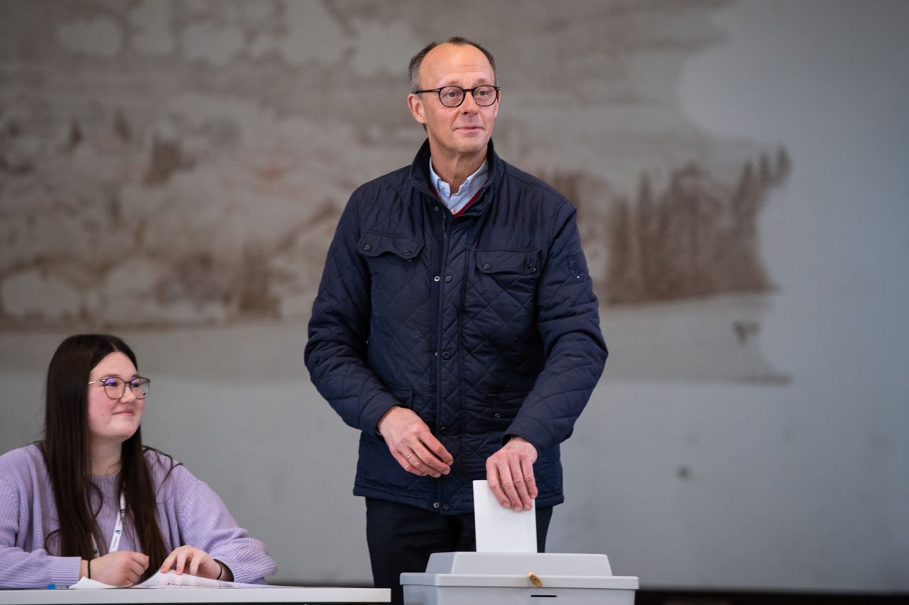 ARNSBERG, GERMANY - FEBRUARY 23: CDU leader Friedrich Merz casts his vote at a polling station in the snap federal parliamentary elections on February 23, 2025 in Arnsberg, Germany. Germany is holding elections today following the collapse of the three-party government coalition last November. (Photo by Hesham Elsherif/Getty Images)