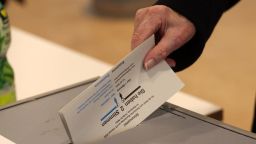 BERLIN,  - FEBRUARY 23: A voter casts his ballot at a polling station a during 's general election on February 23, 2025 in Berlin, .  is holding elections today following the collapse of the three-party government coalition last November. (Photo by Maryam Majd/Getty Images)