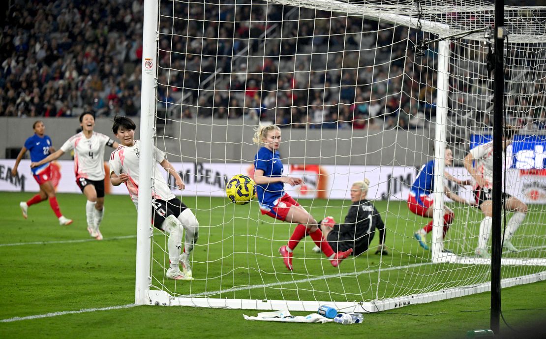 Koga scores the winning goal for Japan.