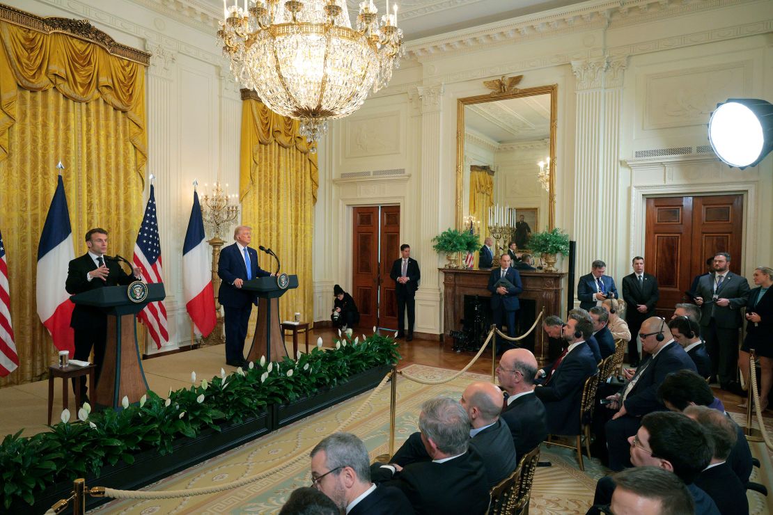 French President Emmanuel Macron and US President Donald Trump hold a joint press conference in the East Room at the White House in Washington, DC, on Monday.