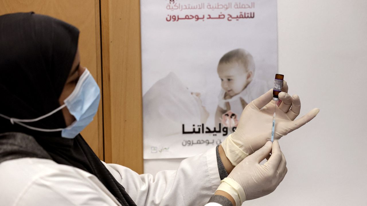 A nurse prepares a doze of measles vaccine at a hospital in the Moroccan coastal city of Temara on February 27, 2025. Authorities in Morocco have been scrambling to contain an outbreak of measles, a contagious and potentially fatal disease that had nearly been eradicated in the kingdom but has rebounded as vaccination rates have fallen. (Photo by Abdel Majid BZIOUAT / AFP) (Photo by ABDEL MAJID BZIOUAT/AFP via Getty Images)          