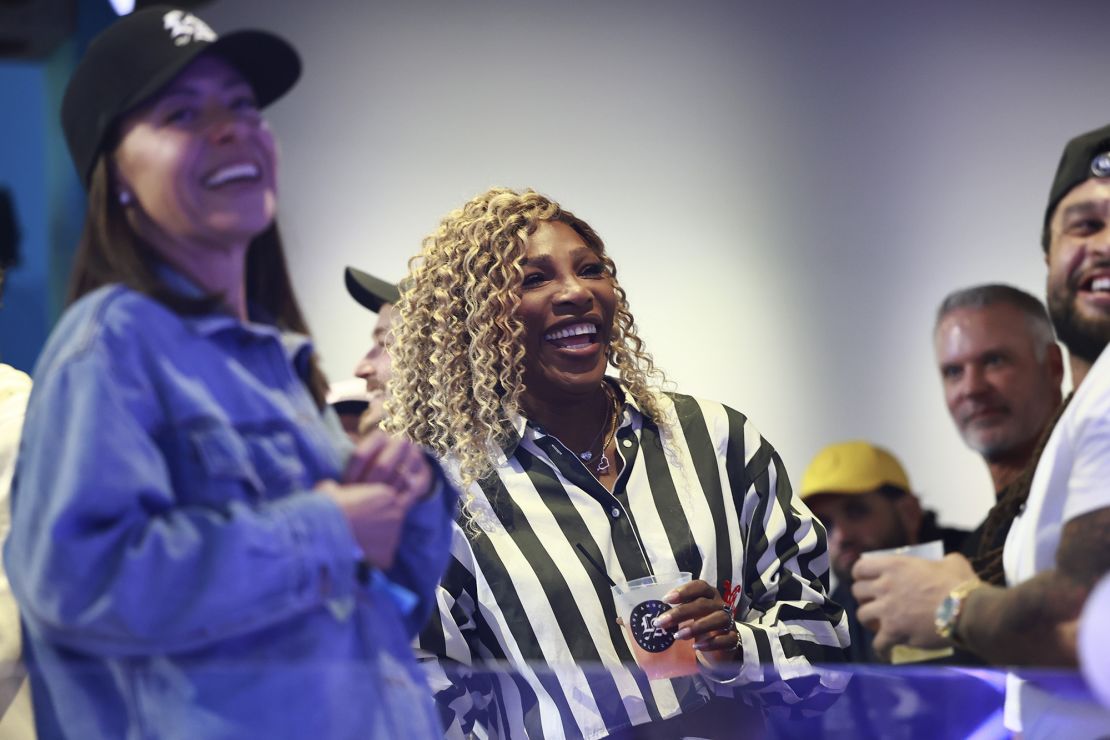 Williams laughs watches the TGL match between LA and New York in Palm Beach Gardens, Florida.