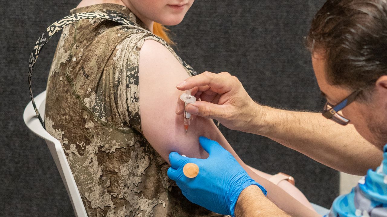 LUBBOCK, TEXAS - MARCH 01: Twelve year old Kyleigh Wilkes, receives an MMR vaccine from Raynard Covarrubio, at a vaccine clinic put on by Lubbock Public Health Department on March 1, 2025 in Lubbock, Texas. Cases of Measles are on the rise in West Texas as over 150 confirmed case have been seen with one confirmed death.(Photo by Jan Sonnenmair/Getty Images)