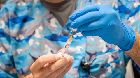 LUBBOCK, TEXAS - MARCH 01: Raynard Covarrubio fills a syringe with the MMR vaccine, at a vaccine clinic put on by Lubbock Public Health Department on March 1, 2025 in Lubbock, Texas. Cases of Measles are on the rise in West Texas as over 150 confirmed case have been seen with one confirmed death.(Photo by Jan Sonnenmair/Getty Images)