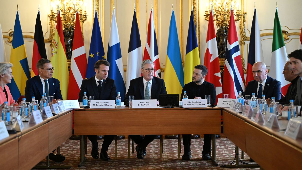 (L-R) European Commission President Ursula von der Leyen, Finland's President Alexander Stubb, France's President Emmanuel Macron, Britain's Prime Minister Keir Starmer, Ukraine's President Volodymyr Zelensky, Romania's Interim President Ilie Bolojan, European Council President Antonio Costa and Canada's Prime Minister Justin Trudeau begin a plenary meeting at a summit held at Lancaster House in central London on March 2, 2025. European leaders descend upon London today for talks to "drive forward" action on Ukraine, according to the office of UK Prime Minister Keir Starmer. The summit caps off a week of intense diplomacy for host Starmer, who met with President Donald Trump on Thursday in an effort to draw together the European and US approaches to the Ukraine conflict. (Photo by JUSTIN TALLIS / POOL / AFP) (Photo by JUSTIN TALLIS/POOL/AFP via Getty Images)          