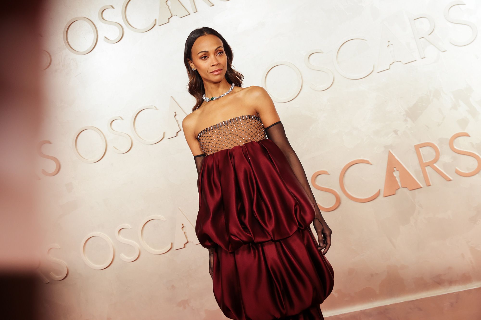 Zoe Saldaña arrives at the Academy Awards in Los Angeles, on March 2.