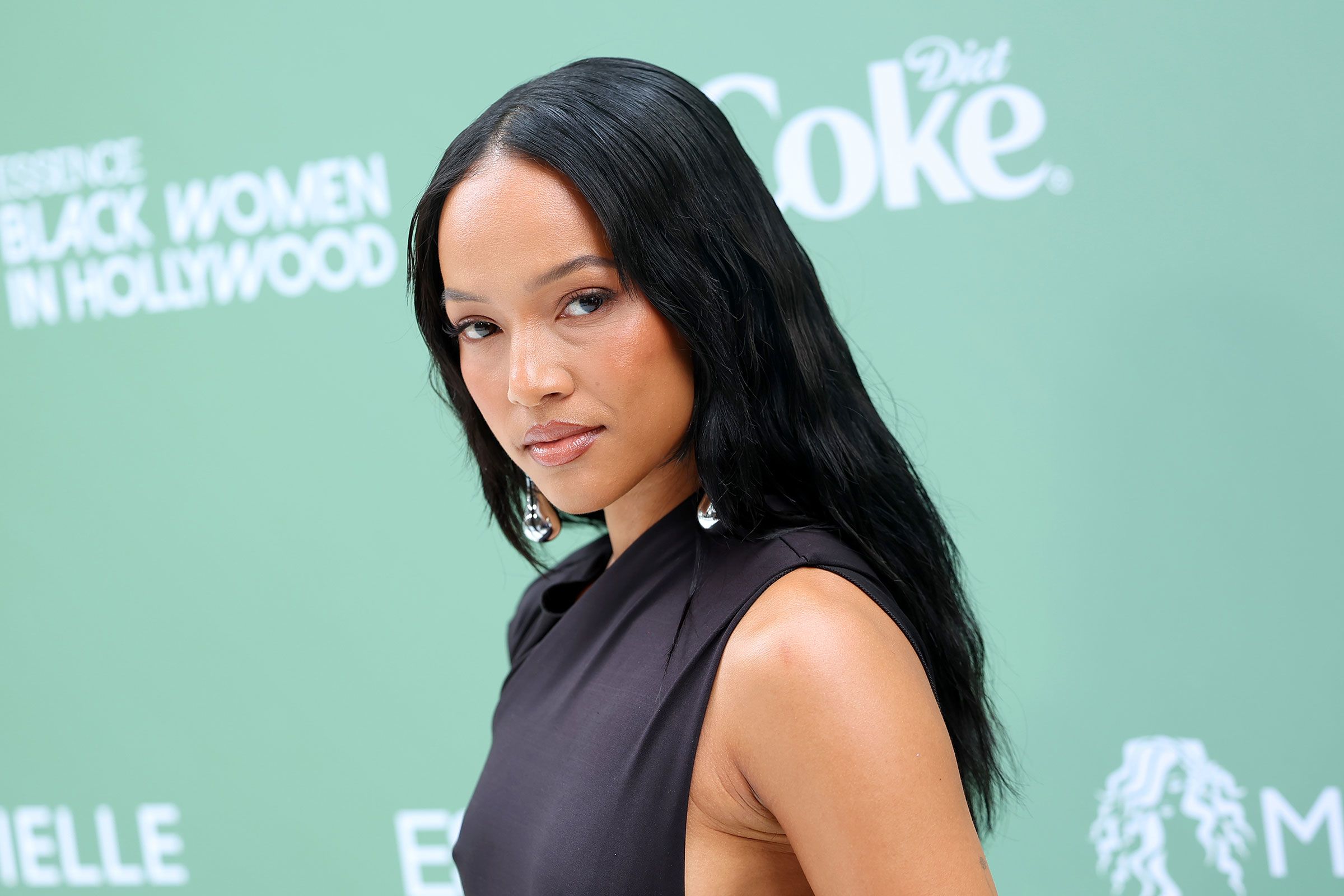 Karrueche Tran stayed by Deion Sanders' side during life-saving surgery.  Here's more about her | CNN