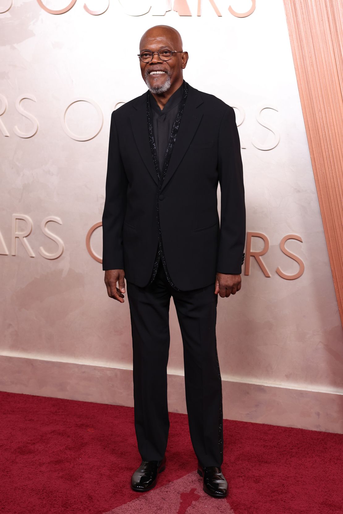 The lapel of Samuel L. Jackson’s all-black outfit subtlety sparkled under the red carpet lights.