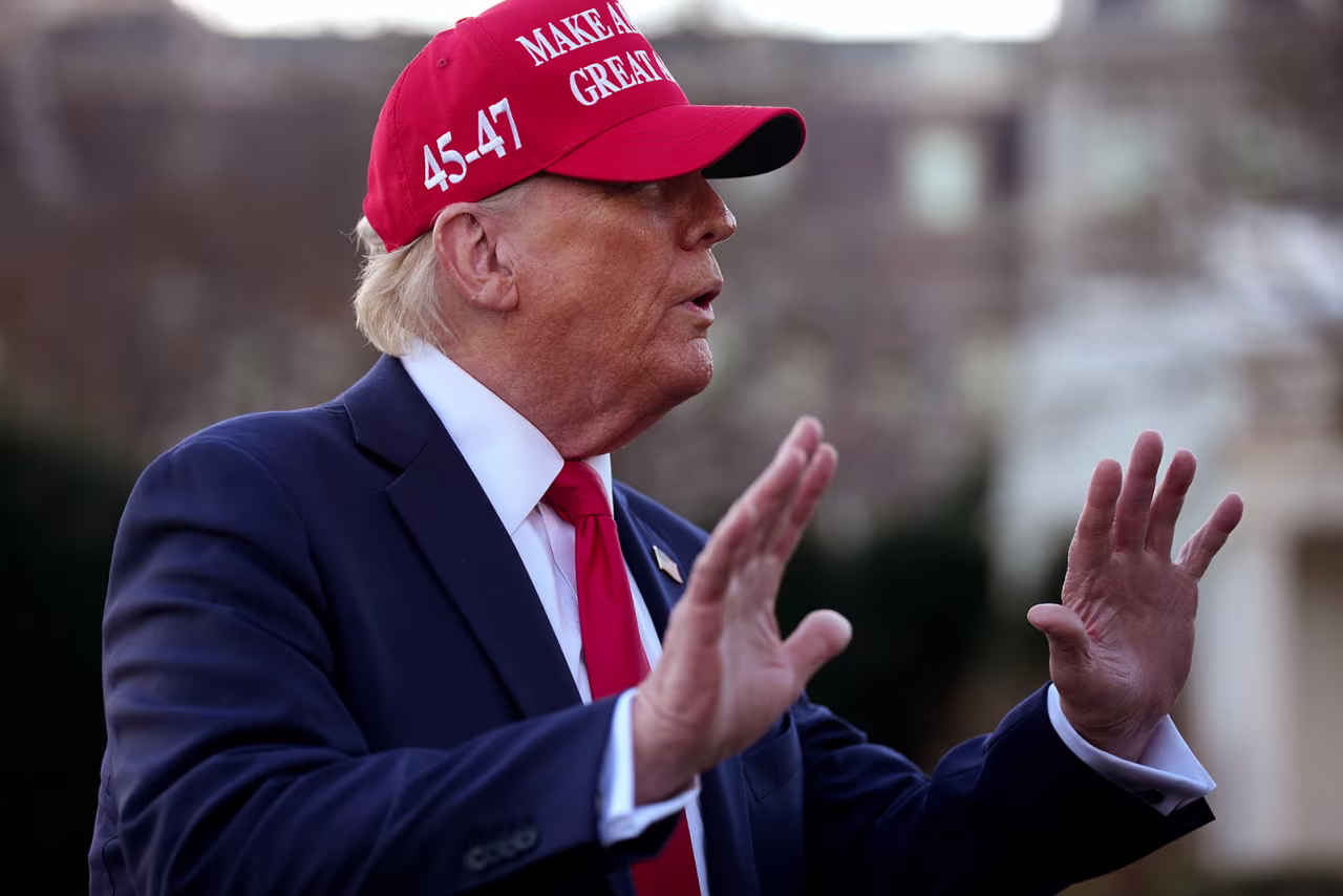 President Donald Trump speaks to reporters as he departs the White House on Friday.