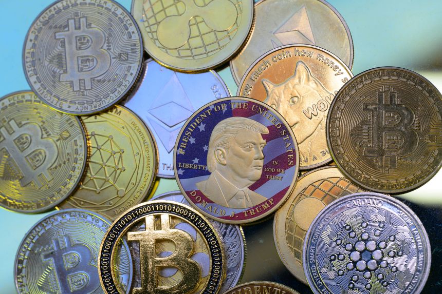 This photo illustration shows a representation of cryptocurrency coins with the $Trump meme coin in Brussels, Belgium, on March 3, 2025.