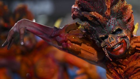A reveller of the Vila Isabel samba school performs during the second night of Rio Carnival at the Marques de Sapucai Sambadrome in Rio de Janeiro, Brazil, on March 4, 2025. (Photo by Mauro PIMENTEL / AFP) (Photo by MAURO PIMENTEL/AFP via Getty Images)          