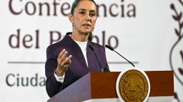 Mexico's President Claudia Sheinbaum speaks to announce that Mexico will hit back at US President Donald Trump's tariffs with retaliatory duties of its own as there was "no reason or justification" for his decision, duing her news conference at the National Palace in Mexico City, on March 4, 2025. Stinging US tariffs on Canadian and Mexican goods came into effect as a deadline to avert President Donald Trump's levies ed without the nations striking a deal -- a move set to snarl supply chains. (Photo by Alfredo ESTRELLA / AFP) (Photo by ALFREDO ESTRELLA/AFP via Getty Images)