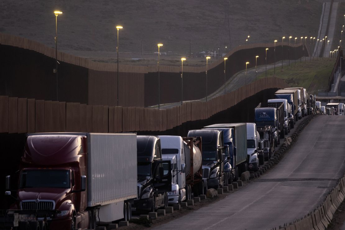 Trucks queue near the Mexico-US border before crossing the border at Otay Commercial crossing in Tijuana, Baja California state, Mexico.