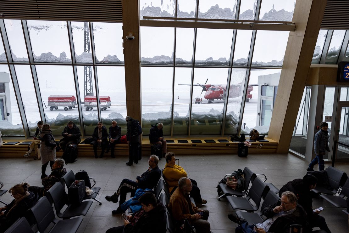 Passengers wait at Nuuk International Airport in Nuuk, Greenland, on March 4, 2025.