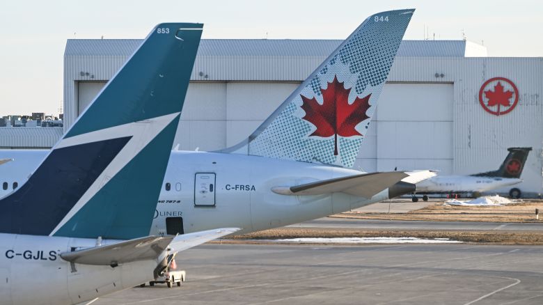 Air Canada and Westjet aircraft parked at Calgary International Airport, in Calgary, Alberta, Canada, on March 4, 2025. In response to U.S. tariffs on Canadian goods, Canada has enacted countermeasures intended to push the U.S. to remove the tariffs as soon as possible.