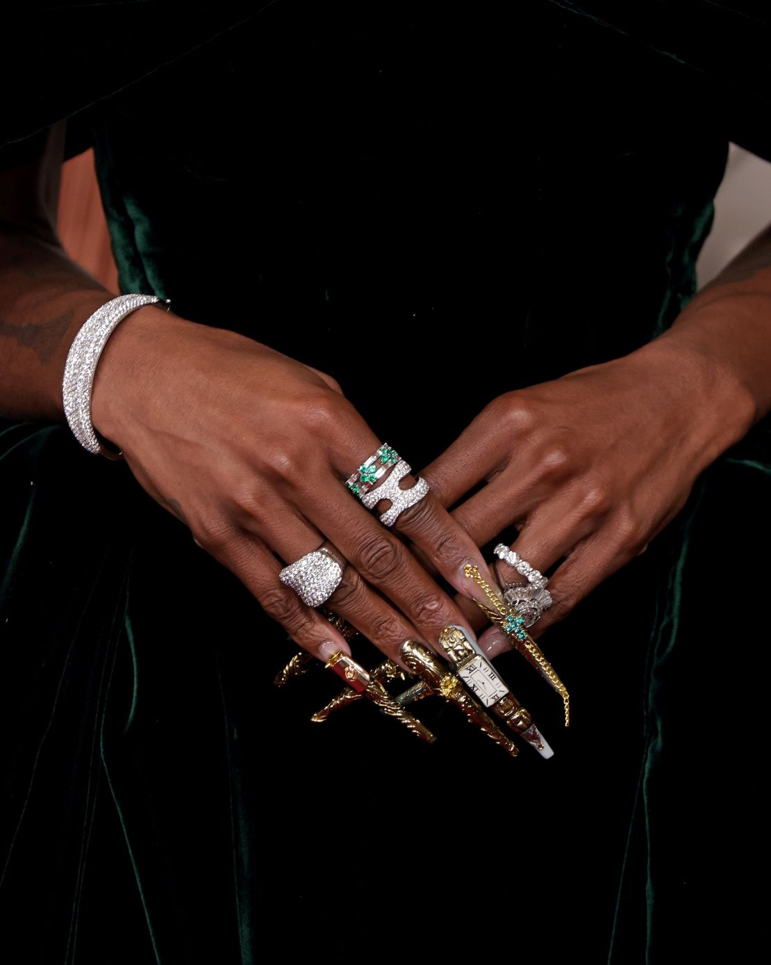 The ensemble was completed with extravagant green and gold nail details — hand-sculpted by her nail artist — as a nod to the fictional land of Oz.