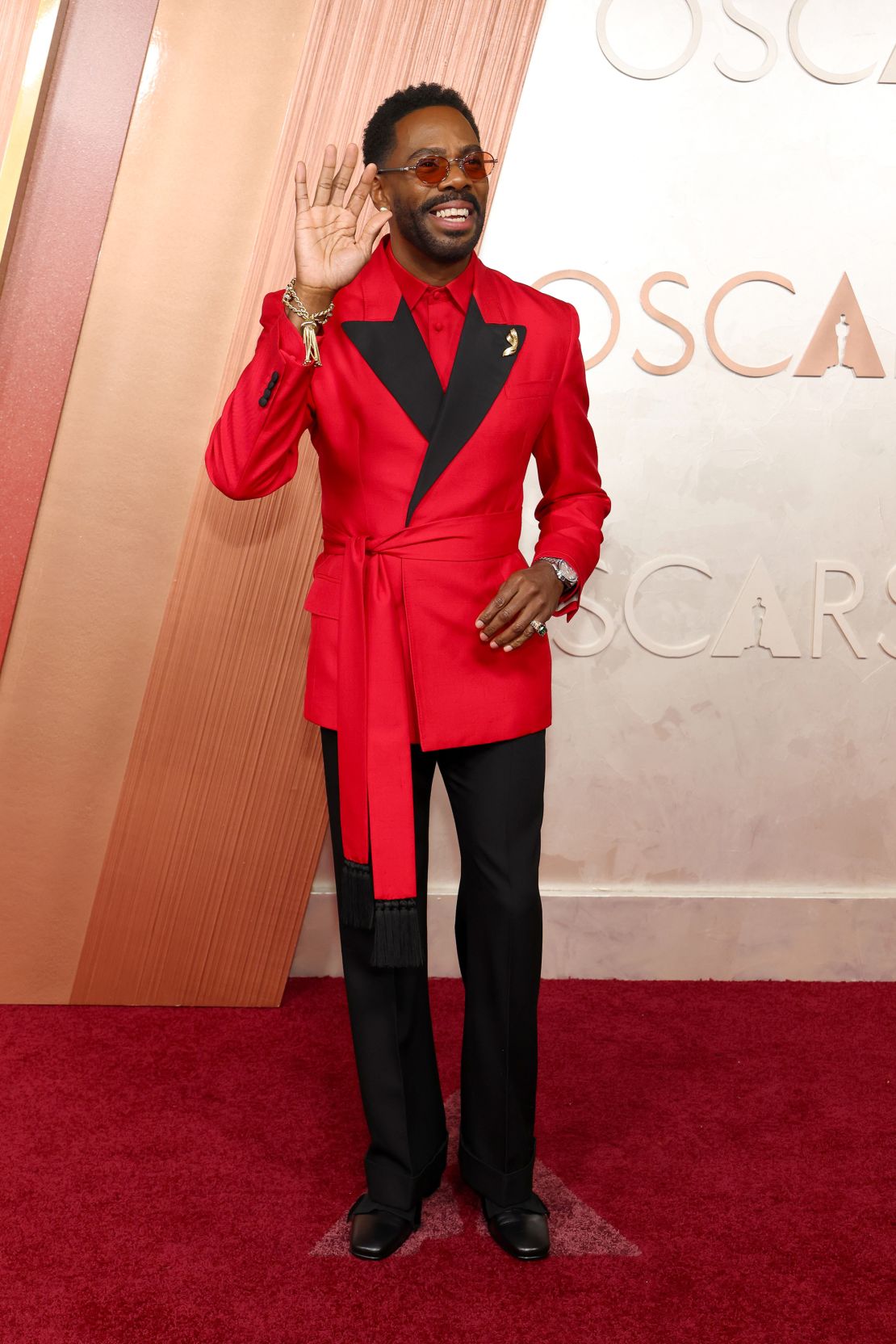 Best Actor nominee Colman Domingo seemingly took inspiration from the carpet itself with a custom Valentino suit featuring a statement piece Boucheron bracelet with a hanging gold tassel.