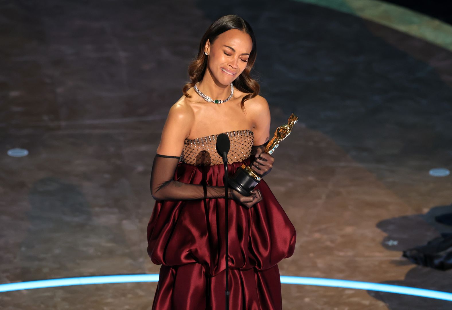 Saldaña <a href="https://www.cnn.com/entertainment/live-news/oscars-academy-awards-03-02-25#cm7se9b3d00153b6n6lkvixt2">accepts the best supporting actress Oscar</a>. She won for her role in "Emilia Pérez" and dedicated her Oscar to her grandmother, noting that she is a proud child of immigrant parents. “The fact that I am getting an award for a role where I got to sing and speak in Spanish? My grandmother, if she were here, would be so delighted."