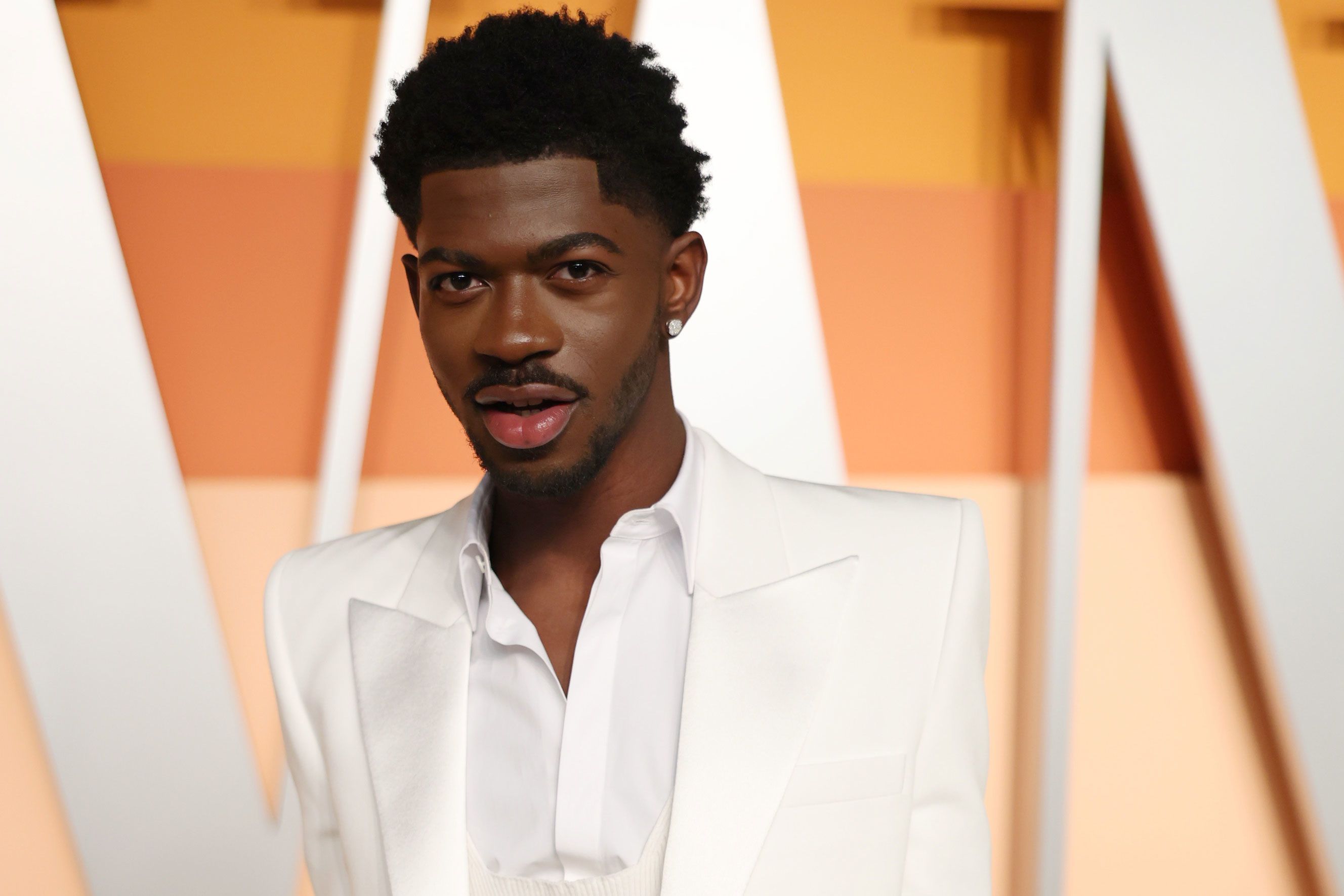 Lil Nas X charged with attacking police officers as he walked naked on Los  Angeles street | CNN
