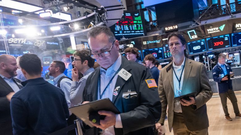 Traders work on the New York Stock Exchange floor on March 3.
