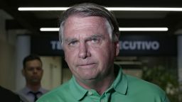 Former Brazilian President (2019-2022) Jair Bolsonaro on arrival at Brasilia airport on March 6, 2025.  (Photo by Sergio Lima / AFP)