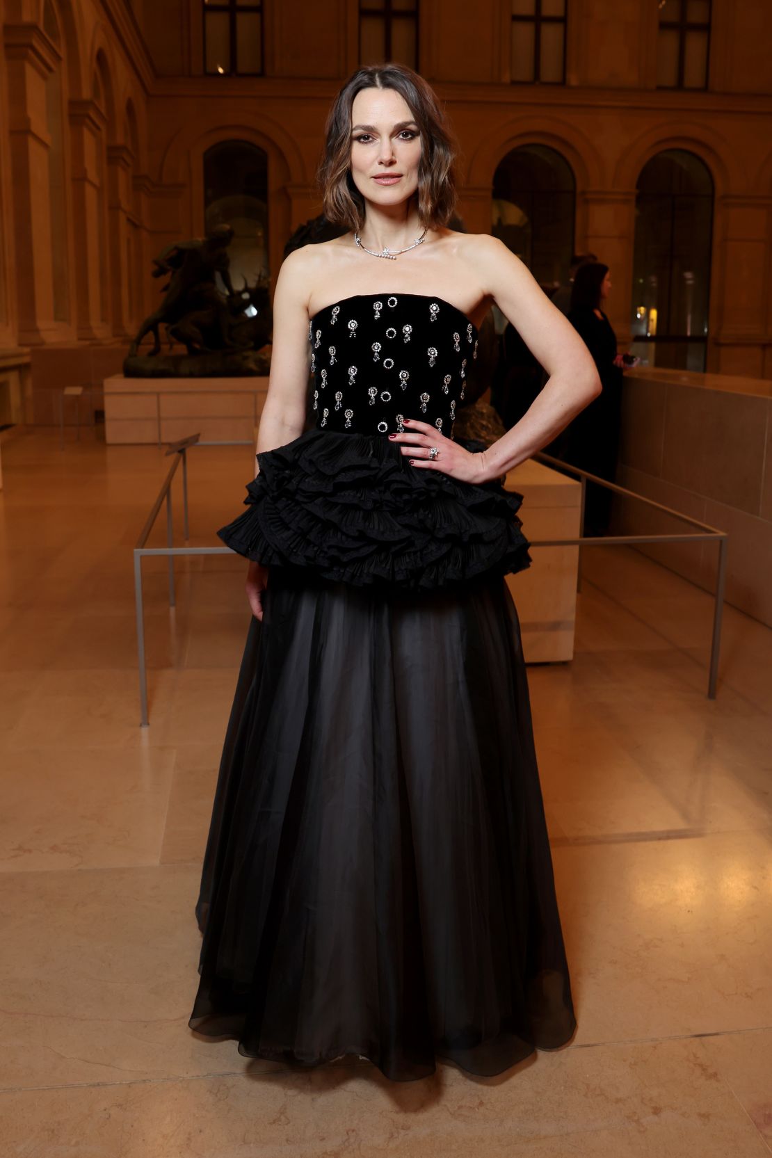 Actor Keira Knightley attended Le Grand Dîner du Louvre wearing Chanel.