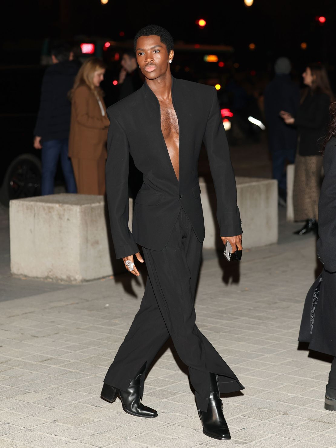 Alton Mason went shirtless under his sharply tailored black suit at the Le Grand Diner du Louvre event.