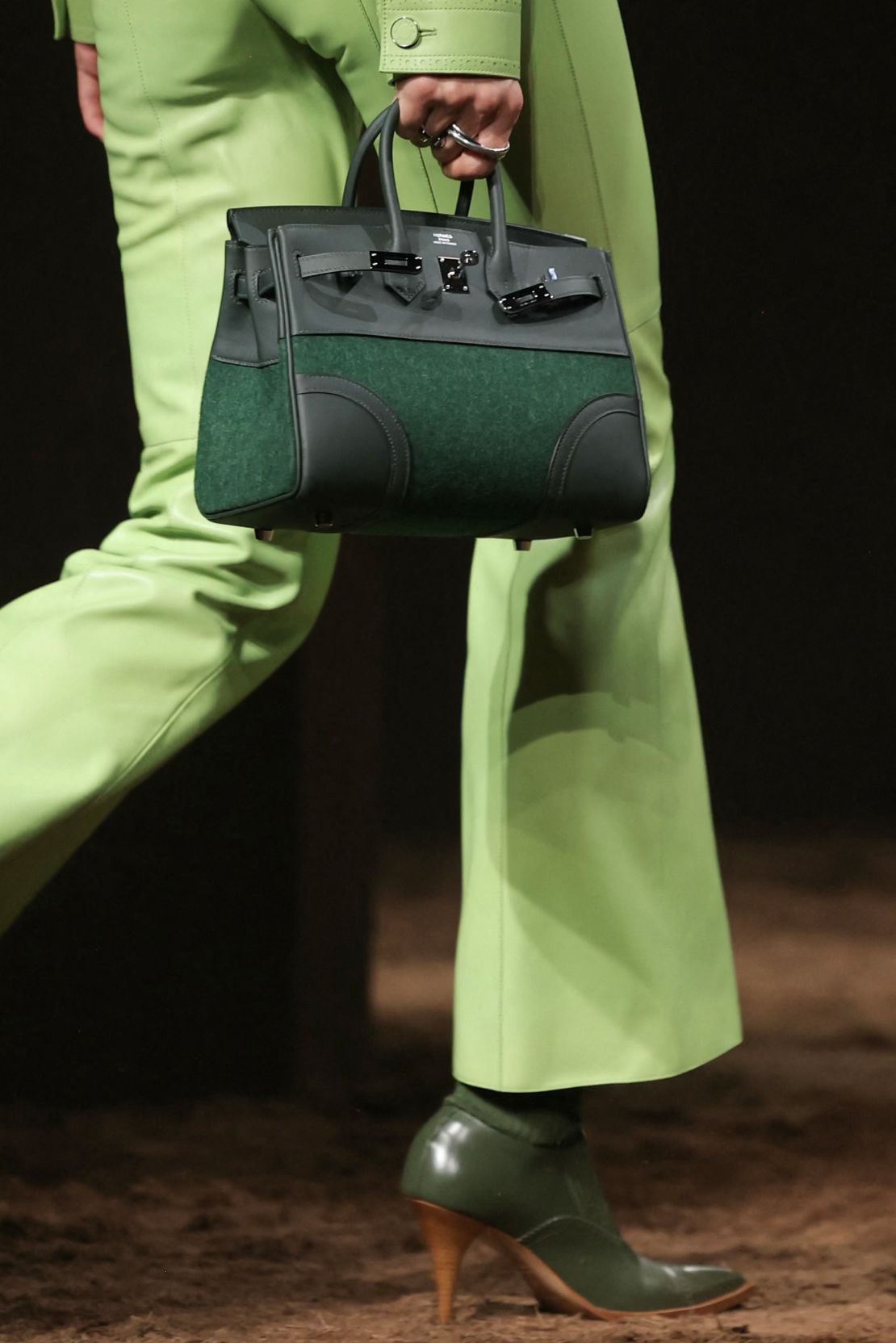 Hermès' Fall-Winter 2025 collection was largely black, bar a few pops of greens and beige.