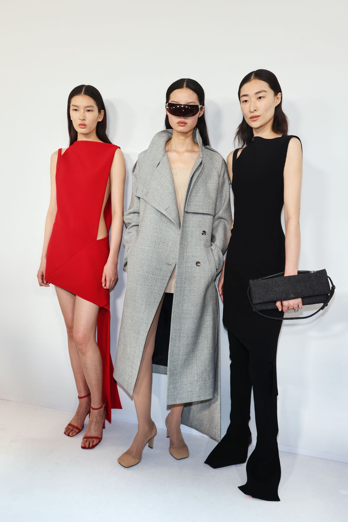 Models pose backstage prior to the Courrèges Womenswear Spring-Summer 2026 show at Paris Fashion Week.