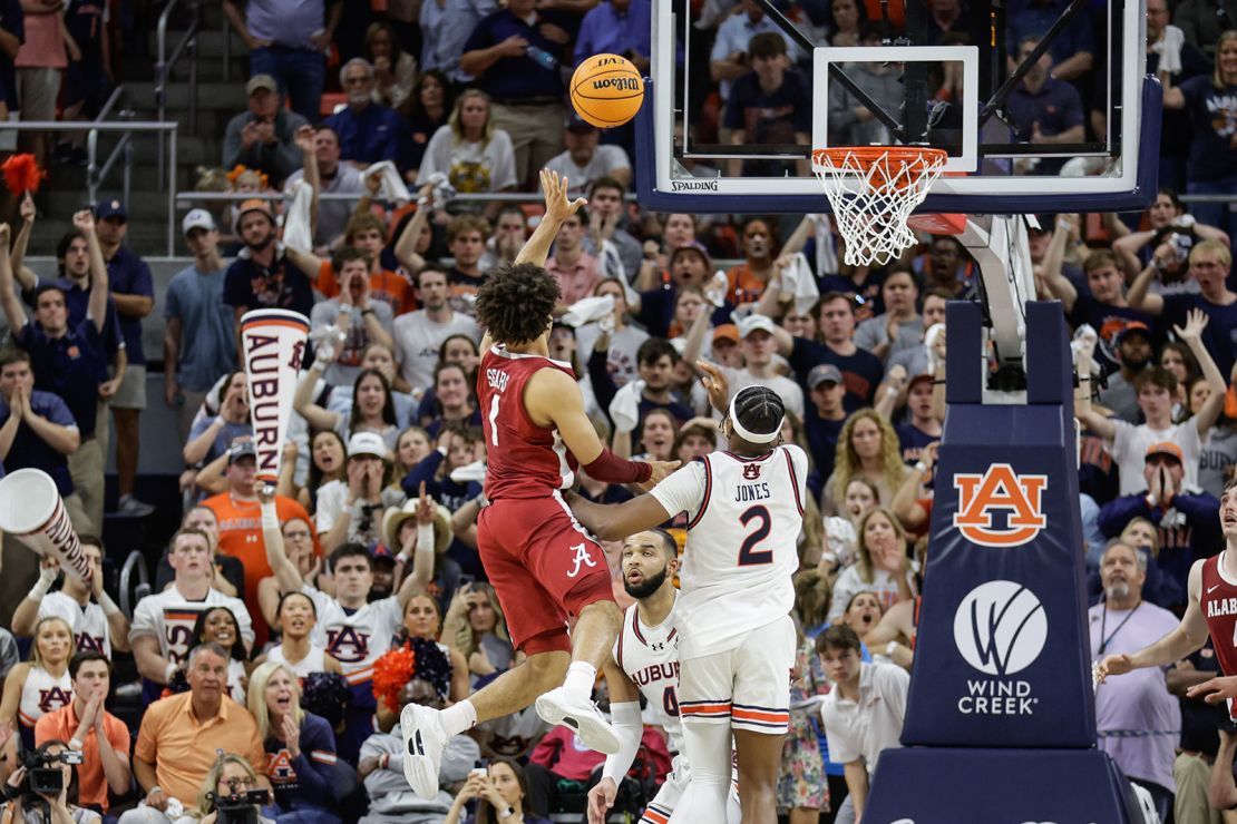 Sears of the Alabama Crimson Tide makes the basket at the buzzer to defeat the Auburn Tigers.