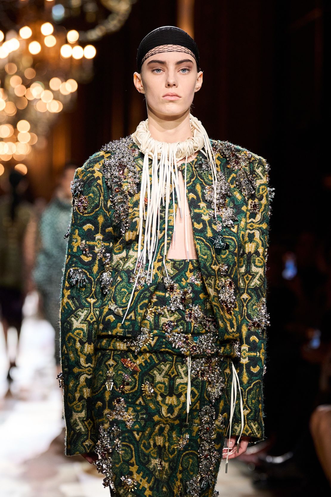 At Dries Van Noten, designer Julian Klausner experimented with fabrics, creating jackets made from tassels or featuring other ornate embellishments.