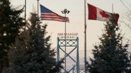 Canadian and American flags fly on the Canadian side of the Ambassador Bridge in Windsor, Ontario, on March 8, 2025. US President Donald Trump imposed vast tariffs this week on key partners Canada and Mexico, roiling cross-border ties before offering temporary relief to manufacturers -- but with more levies kicking in next week, the respite may be fleeting.