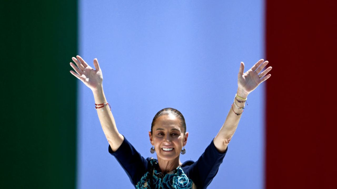 TOPSHOT - Mexico's President Claudia Sheinbaum gestures during a rally at the Zocalo square in Mexico City on March 9, 2025. Sheinbaum credited "dialogue" for her US counterpart Donald Trump's decision to offer temporary relief on tariffs imposed on goods from her country, and she declared herself 'optimistic' about the future of the trade relationship, but also warned: 'We cannot give up our sovereignty'. (Photo by Alfredo ESTRELLA / AFP) (Photo by ALFREDO ESTRELLA/AFP via Getty Images)