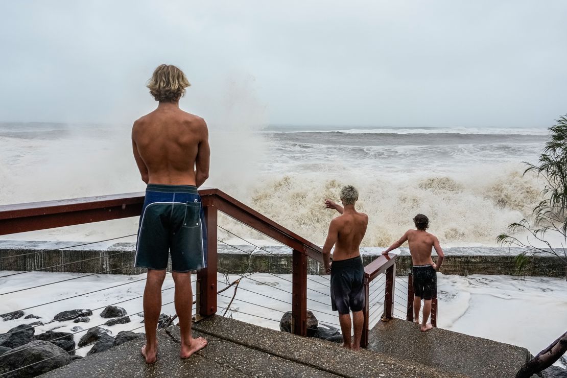 Onlookers watch hazardous waves on March 7, 2025 in Tweed Heads, Australia.