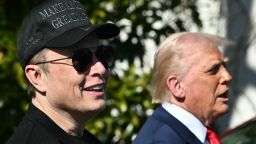 US President Donald Trump and Tesla CEO Elon Musk speak to the press as they stand next to a Tesla vehicle on the South Portico of the White House on March 11, 2025 in Washington, DC. (Photo by Mandel NGAN / AFP) (Photo by MANDEL NGAN/AFP via Getty Images)          