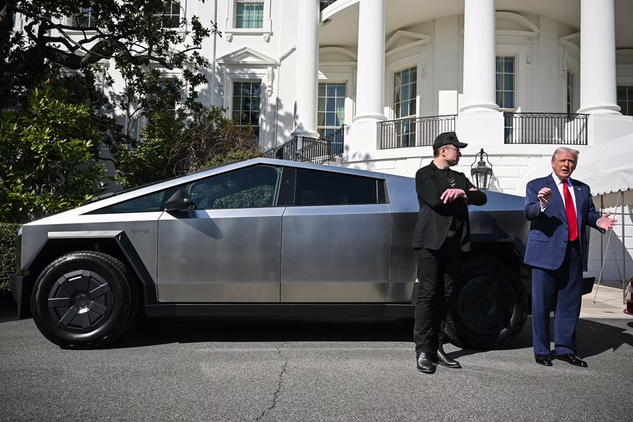 President Donald Trump and Tesla CEO Elon Musk speak to the press as they stand next to a Tesla Cybertruck on the South Portico of the White House on March 11 in Washington, DC.