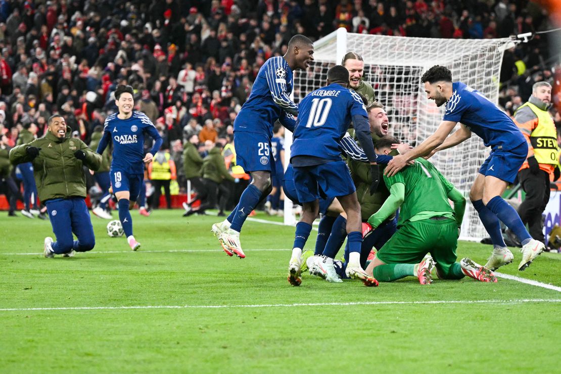 Paris Saint-Germain players celebrate after winning the shootout against Liverpool.