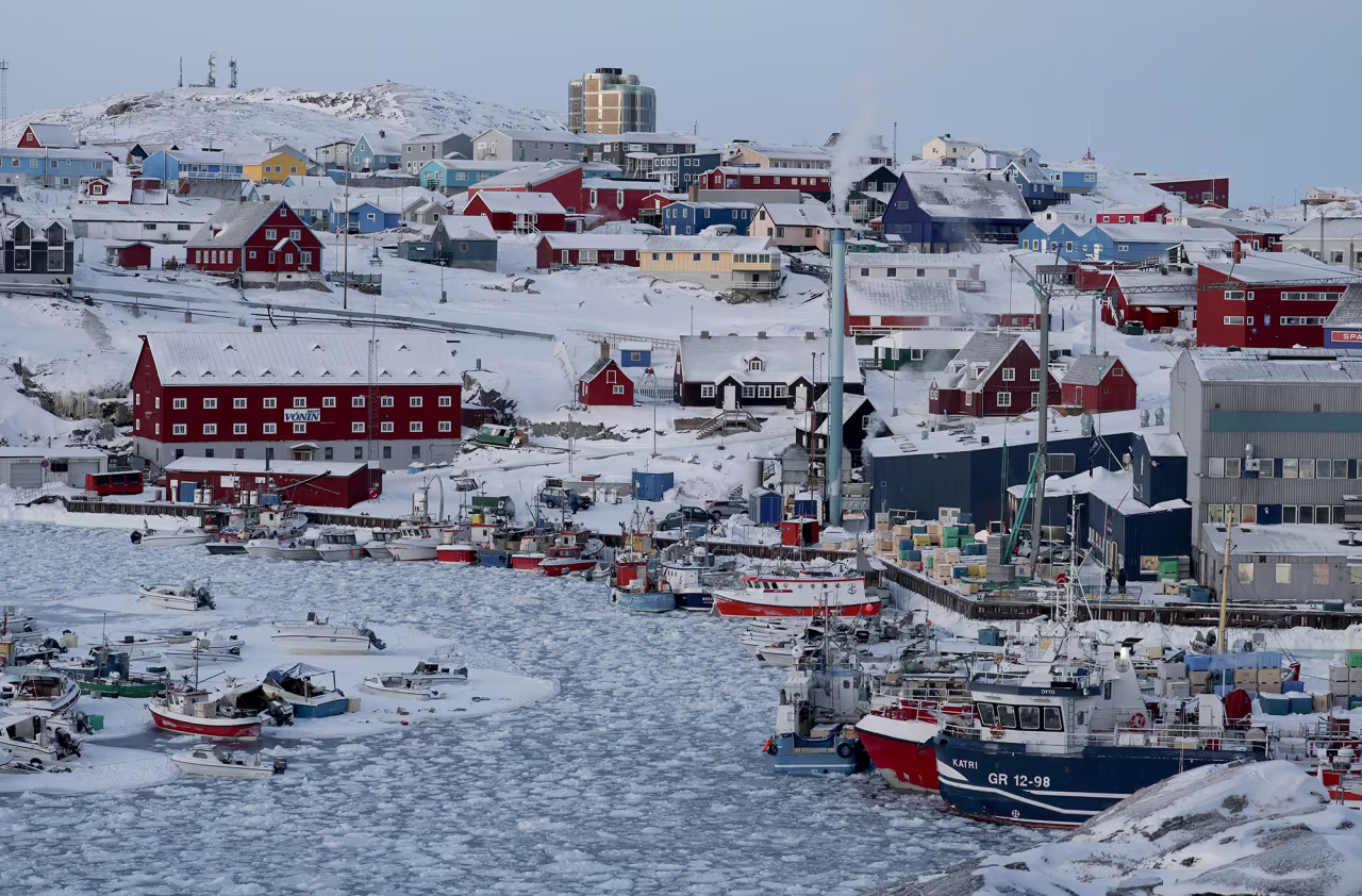 Ice covers the water in the harbor on March 8 in Ilulissat, Greenland.