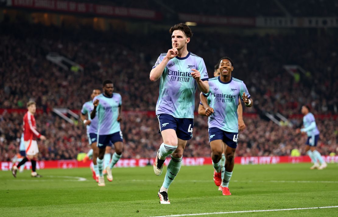 Declan Rice celebrates scoring Arsenal's equalizer against Manchester United.